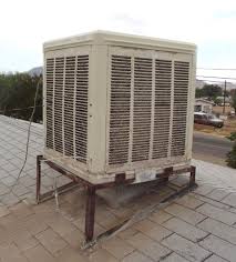 Down draft swamp cooler. Down draft swamp cooler on a roof